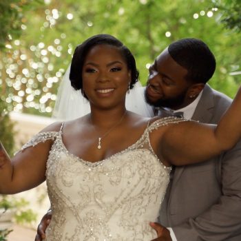 Couple in front of gate