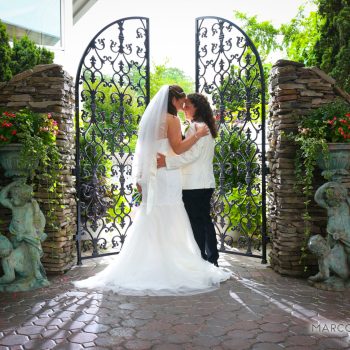 Couple in front of gate
