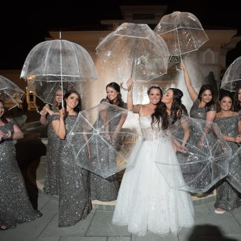 Bridal party with umbrellas